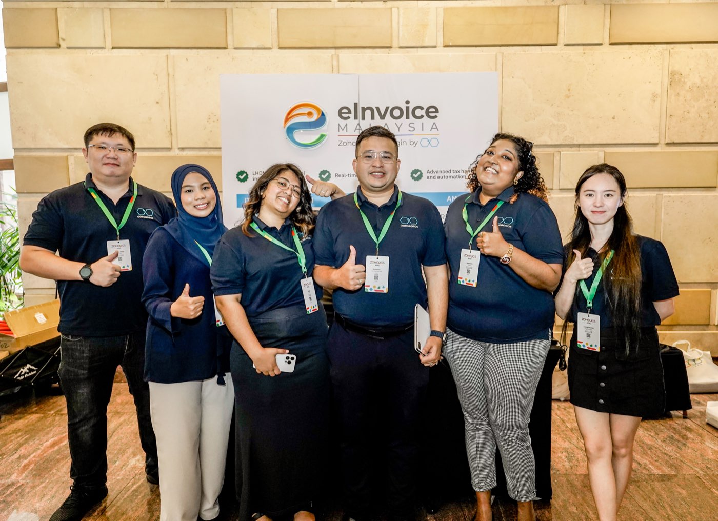 The Ooroboros team at the eInvoice Malaysia booth, Zoholics APAC